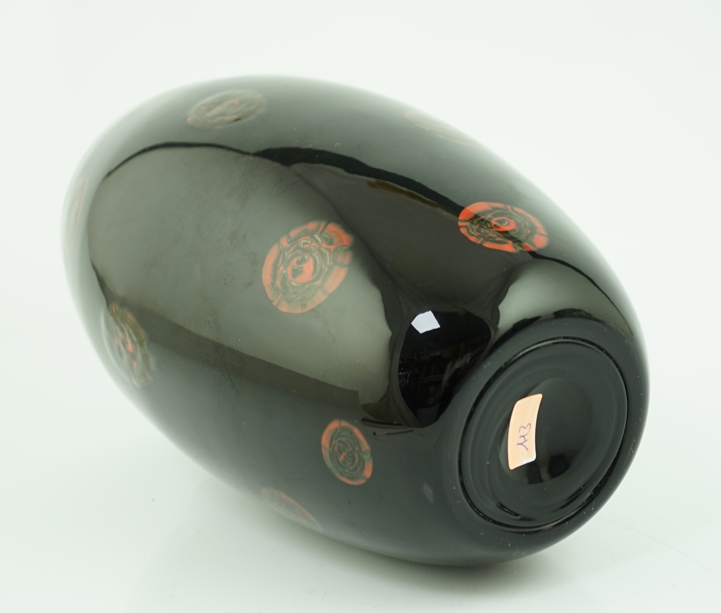 Vittorio Ferro (1932-2012) A Murano glass Murrine vase, with bronze roundels on a black ground, unsigned, 28cm, Please note this lot attracts an additional import tax of 20% on the hammer price
